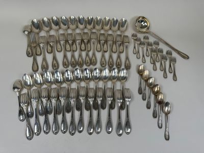 many spoons and spoons laid out on the table