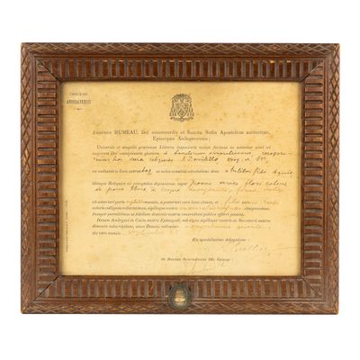 an old document with a wooden frame on a white background