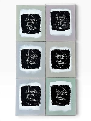 four squares of black and white artwork on a white surface