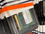 a close up of a computer memory in a plastic container