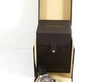 a watch that is sitting in a box on a table