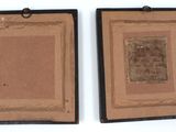 two framed pictures of a couple of brown squares on a white surface