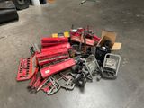 a pile of tools on the floor in a garage