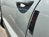 a sticker on the door handle of a car