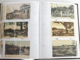an open book with pictures of old buildings on it