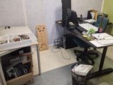 an image of a work space with a desk and a chair