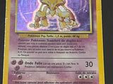 a close up of a pokemon card on a table