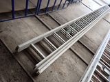 several metal bars that are laying on the ground