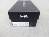 a black box with a picture of a horse drawn carriage on it