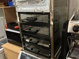 a toaster oven and a toaster oven sitting on a counter