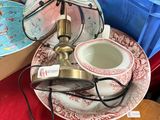 many plates and cups sitting on a red table