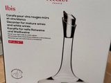 packaging of a wine decanter in a box on a table