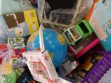 a pile of children ' s toys and toys in a bin