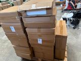 many boxes stacked on top of each other in a warehouse