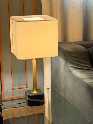 a lamp that is sitting on a table in a living room