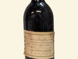 a bottle of wine that is sitting on a table