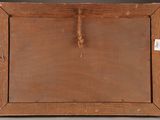 an old wooden frame with a rope hanging from it