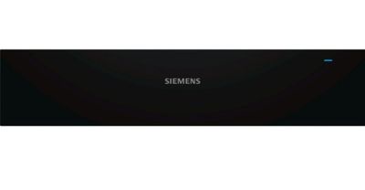 une photo en noir et blanc du nom « Siemens » sur le mur