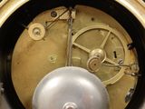 a clock that is sitting on top of a table