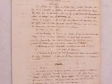 un gros plan d'un morceau de papier sur lequel on a écrit