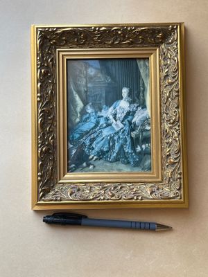 a picture of a painting on the wall next to a pen