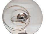 an image of a glass table lamp with a metal base