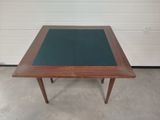an image of a table with a green cloth on it