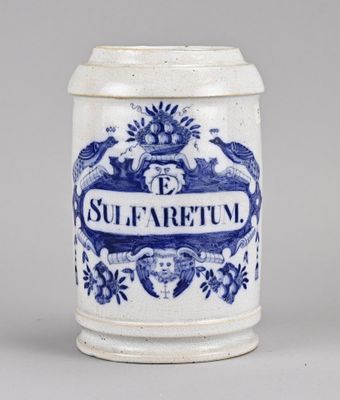 an old blue and white mug with the word sulparretum on it