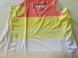 a white table with a yellow and pink shirt on it
