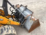 an image of a tractor with a bucket attached to it ' s back end