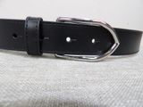 a close up of a black belt with a silver buckle