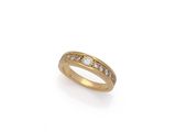 a gold ring with diamonds on a white background