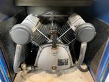 a machine that is sitting inside of a blue box