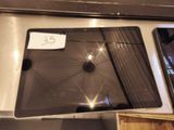 a picture of a glass display case with a clock on it