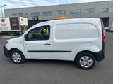a white van that is parked in a parking lot