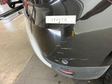 a close up of a car with a sticker on it ' s bumper