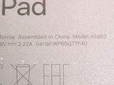 a close up of the back of a white ipad