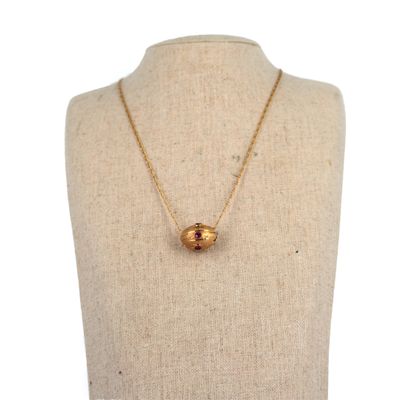 a close up of a mannequin torso with a necklace on it
