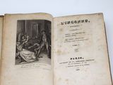 un vieux livre avec l'image d'un homme et d'une femme