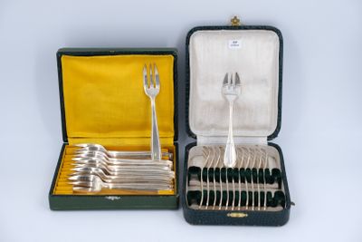 a case with silverware in it on a white surface