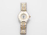 an image of a woman ' s wrist watch on a white surface