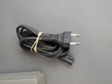 a black cord that is connected to a computer mouse