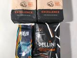 three bags of coffee sitting next to each other on a table
