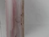 a clear box with a pink object inside of it