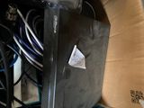 an image of a box with a computer and wires in it