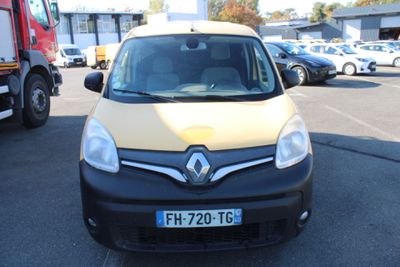a yellow and black car parked in a parking lot