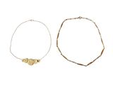 two bracelets with gold beads on a white background