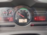 a close up of a car dashboard with a speedometer