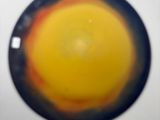 a picture of a picture of a yellow and blue circle