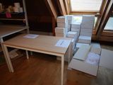 many boxes on the table in the room